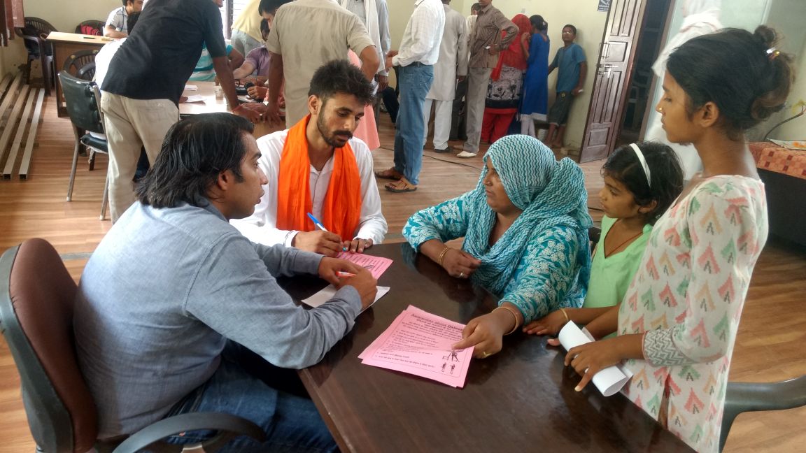Doctor consulting a village resident